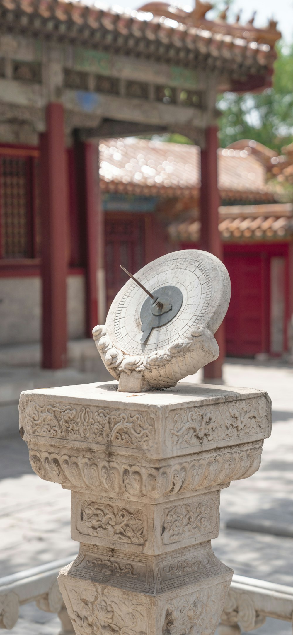 a clock on a pillar