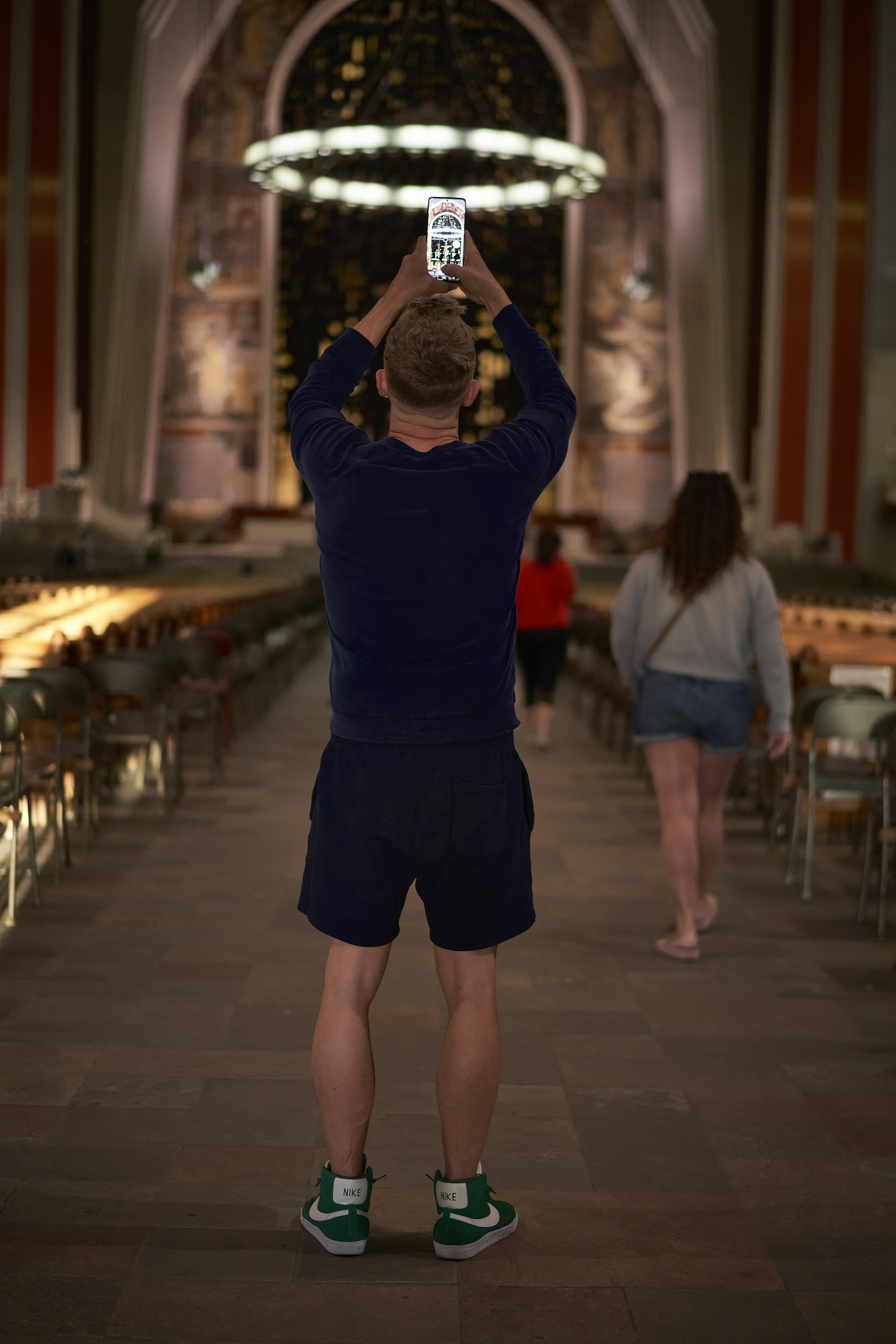 a person taking a picture of himself in a mirror