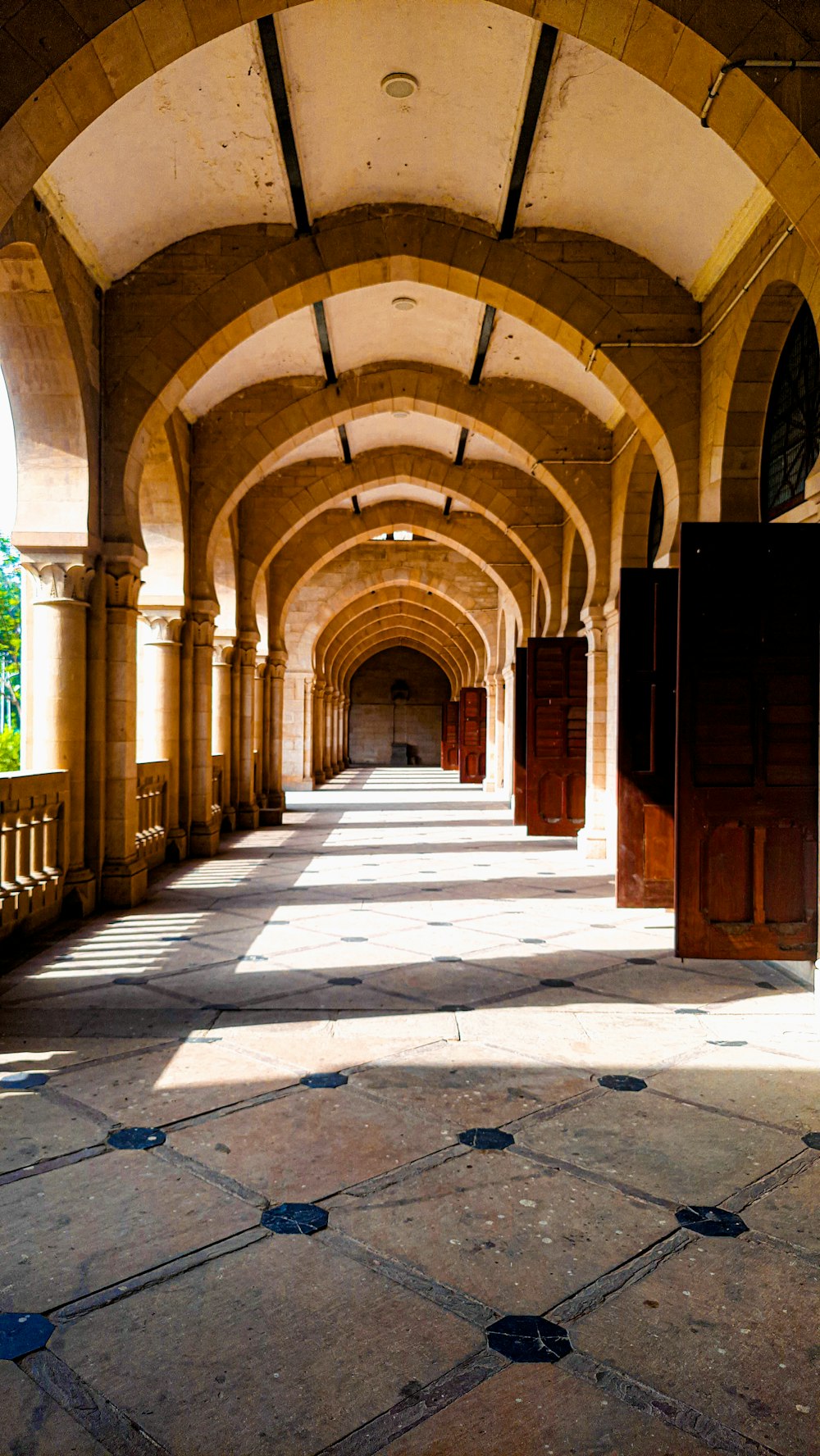 a hallway with arched ceilings