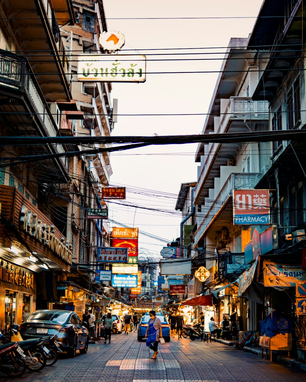 a busy street with many shops