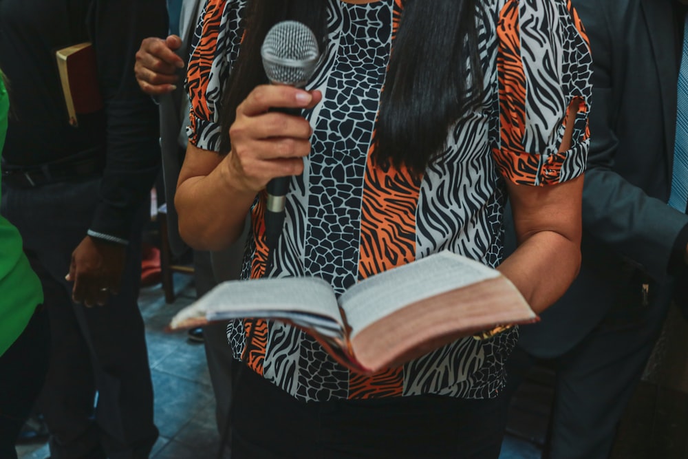 a person holding a microphone