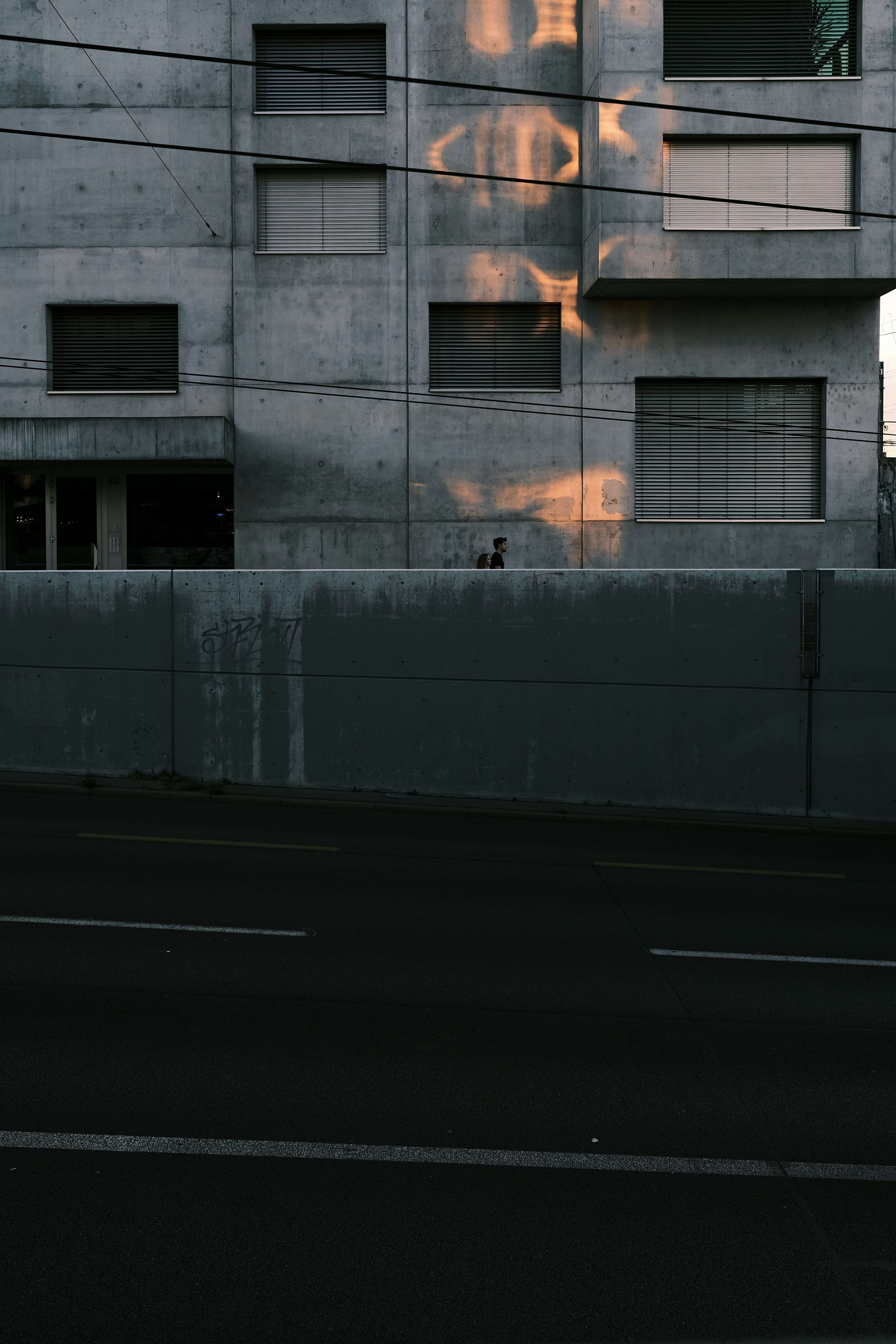 a person standing on a street corner