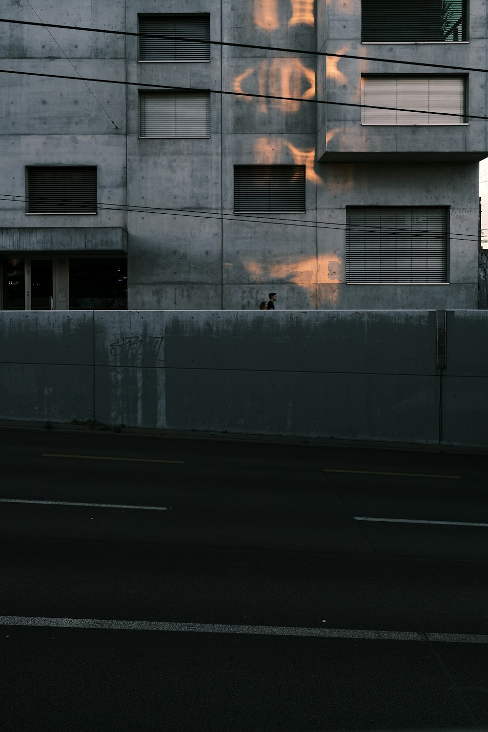 a person standing on a street corner