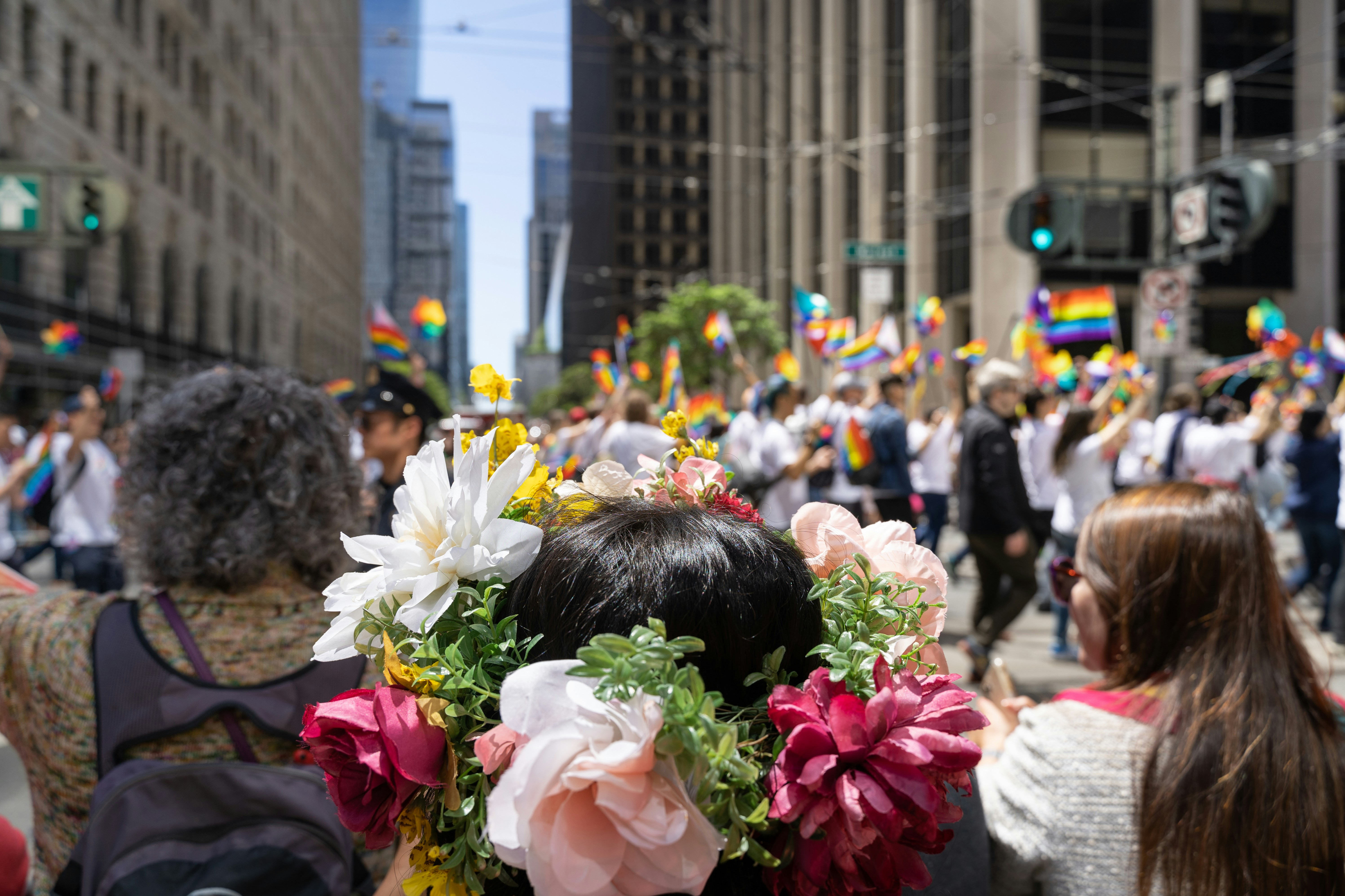 a crowd of people in an urban setting