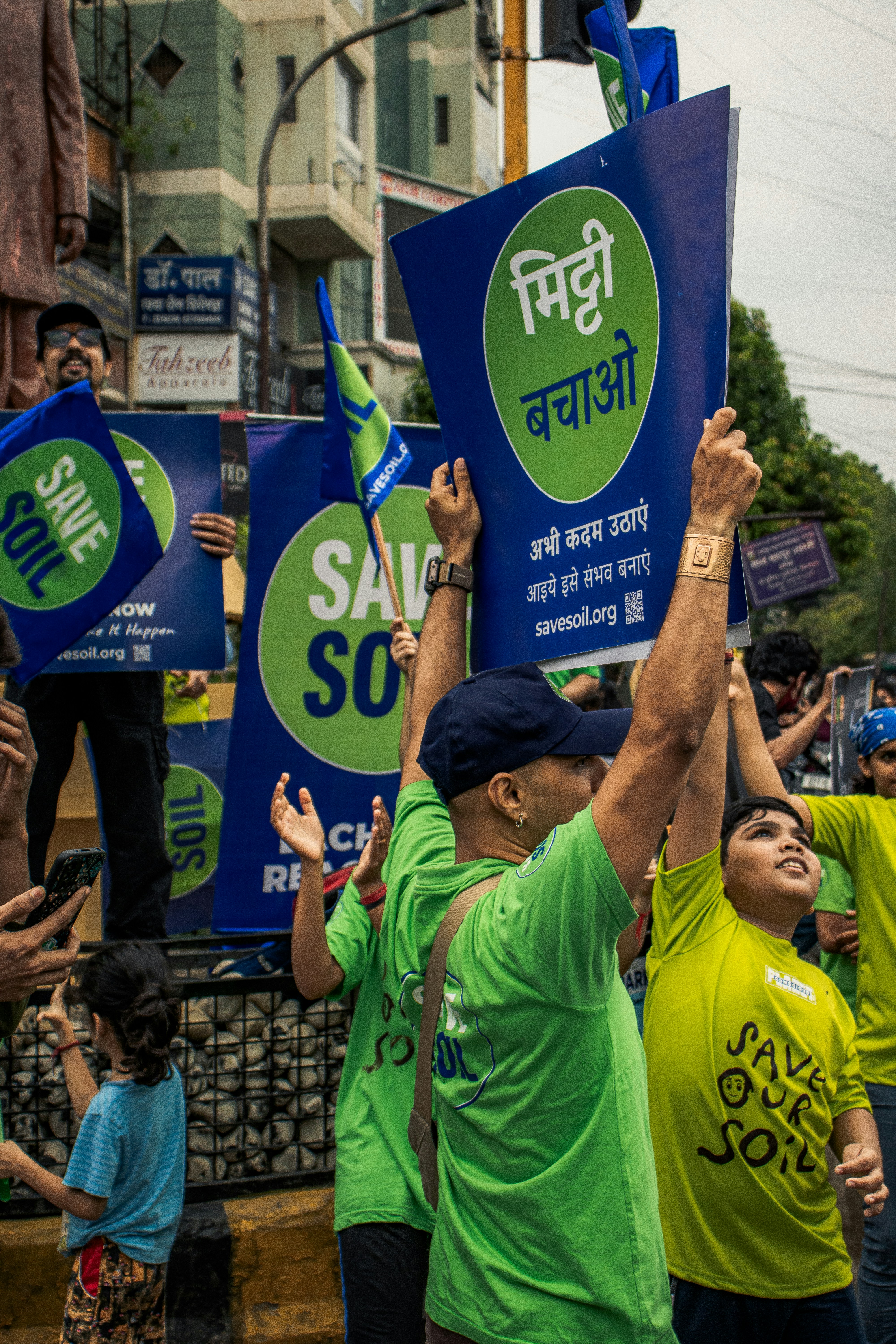 a group of people holding signs