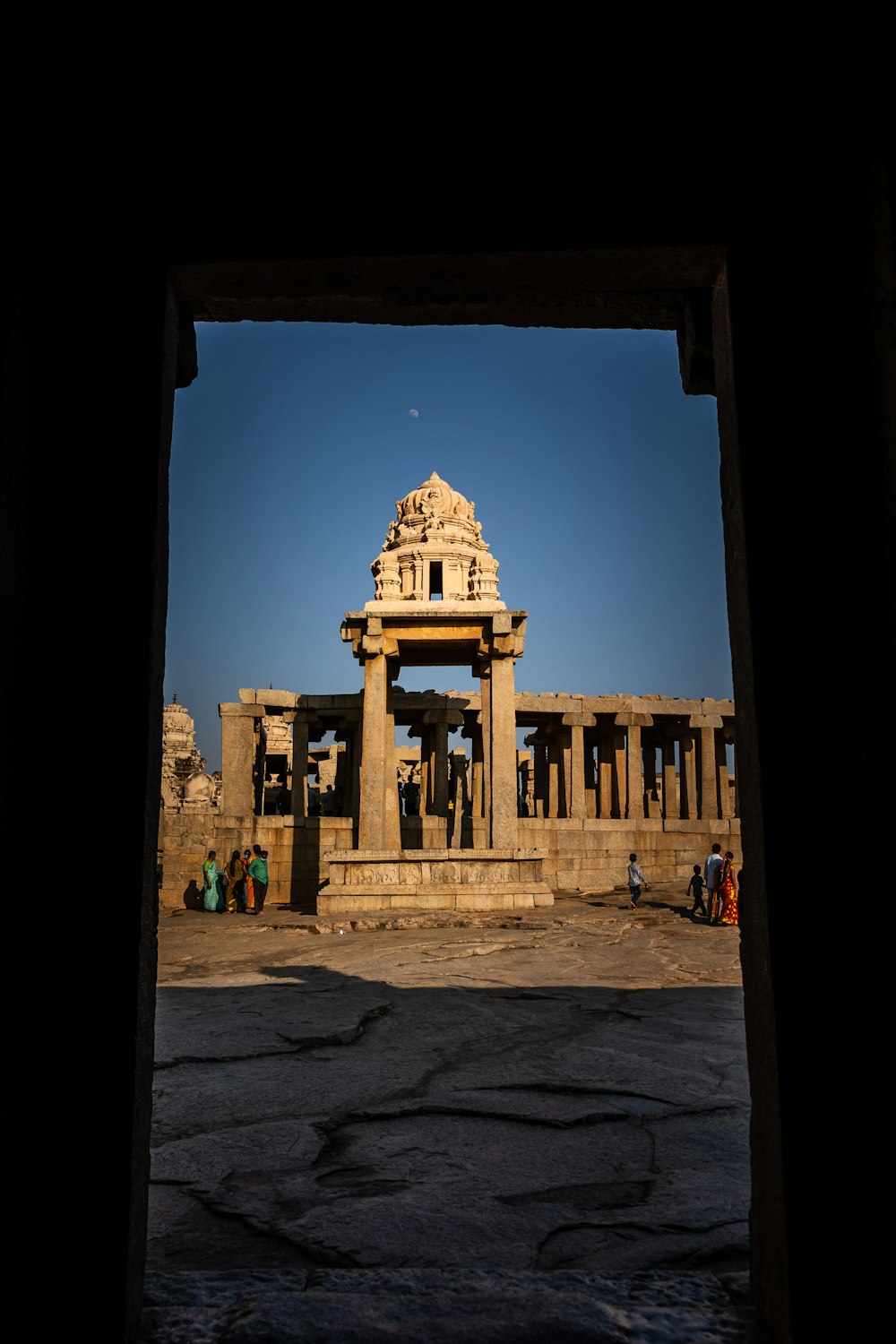 a building with a dome and columns