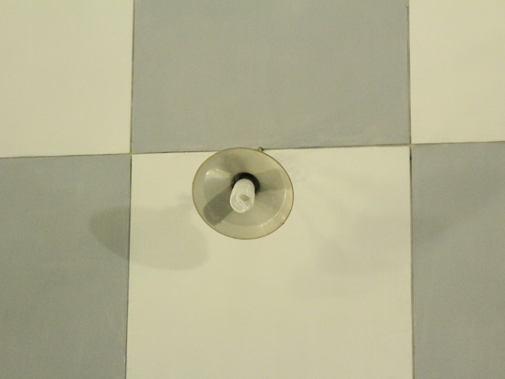 a white circular object with a hole in it