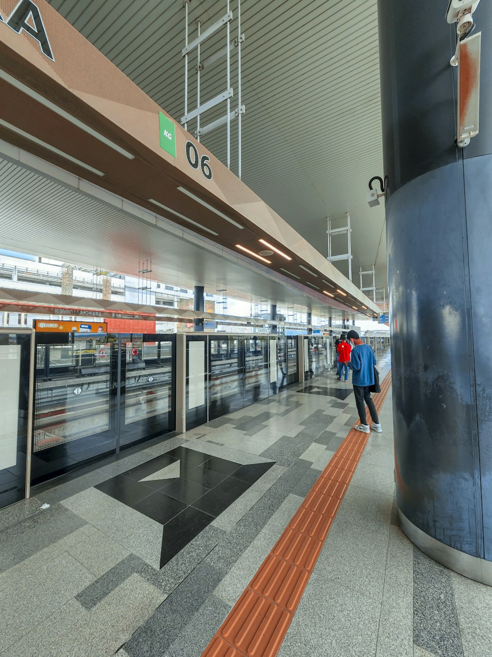 people walking in a train station