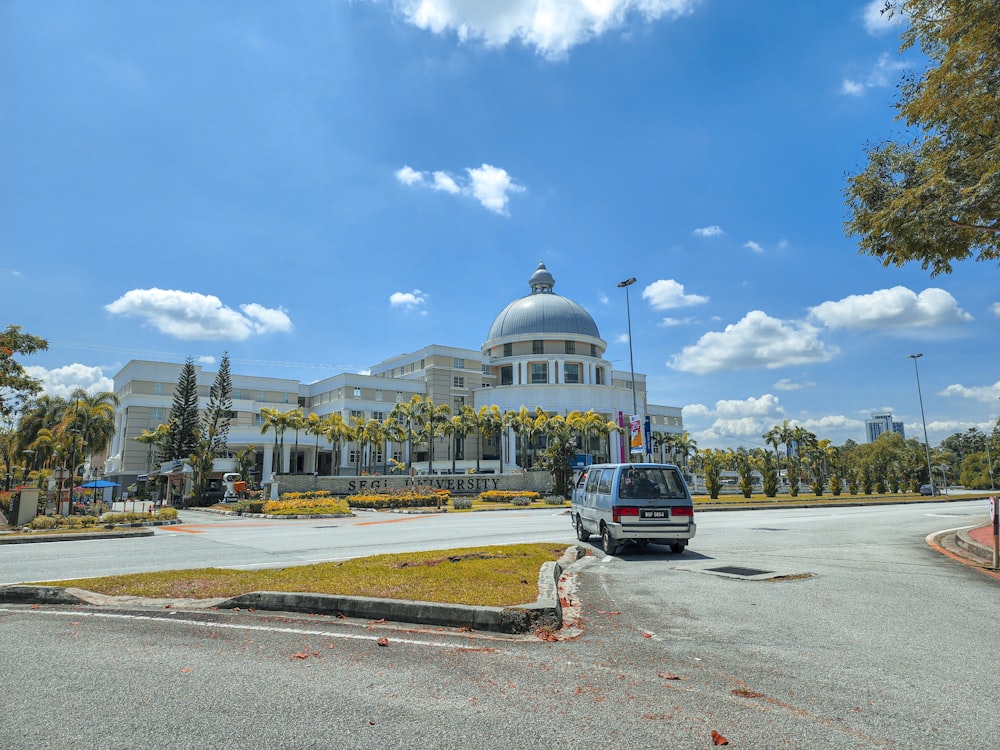 a white building with a dome and a dome on top