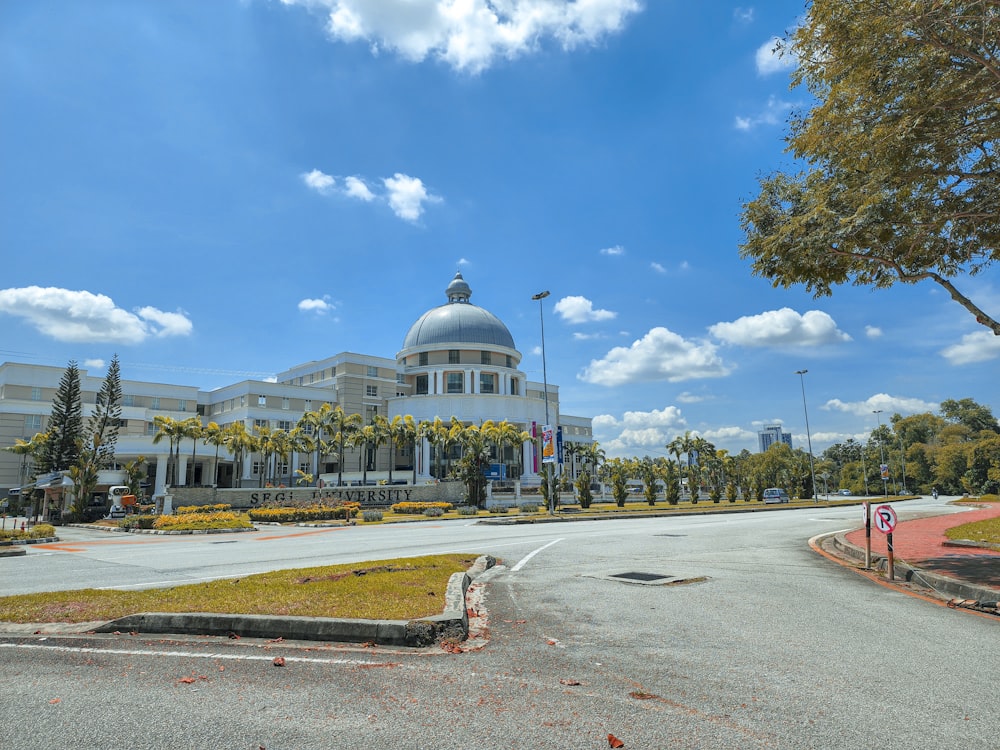 a large white building with a dome