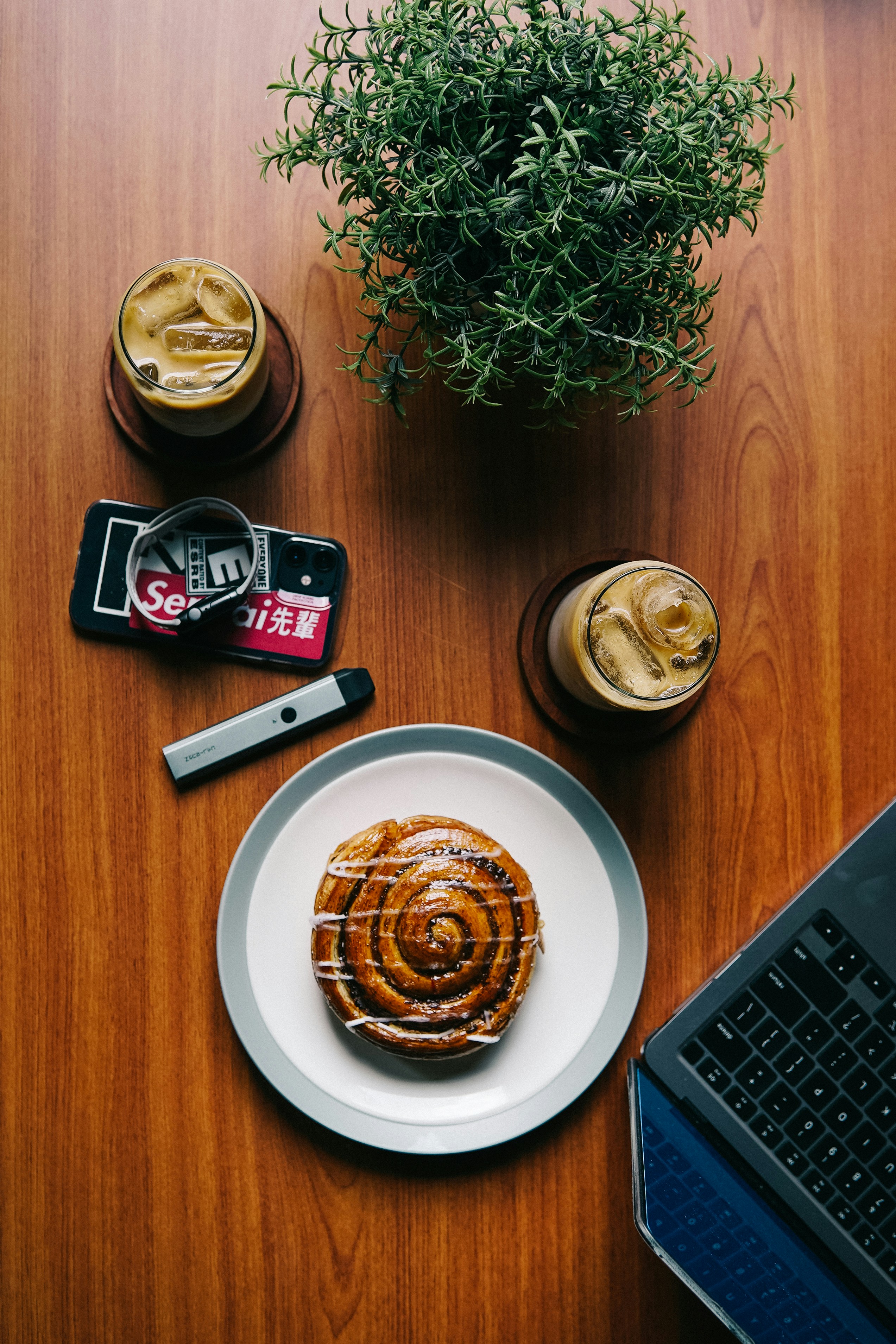 a plate of food and a laptop