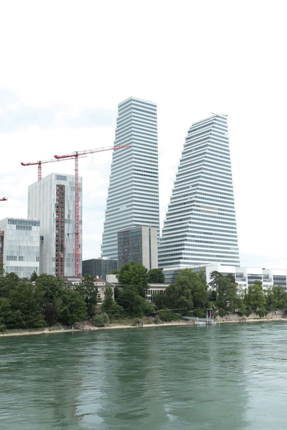 a body of water with buildings around it