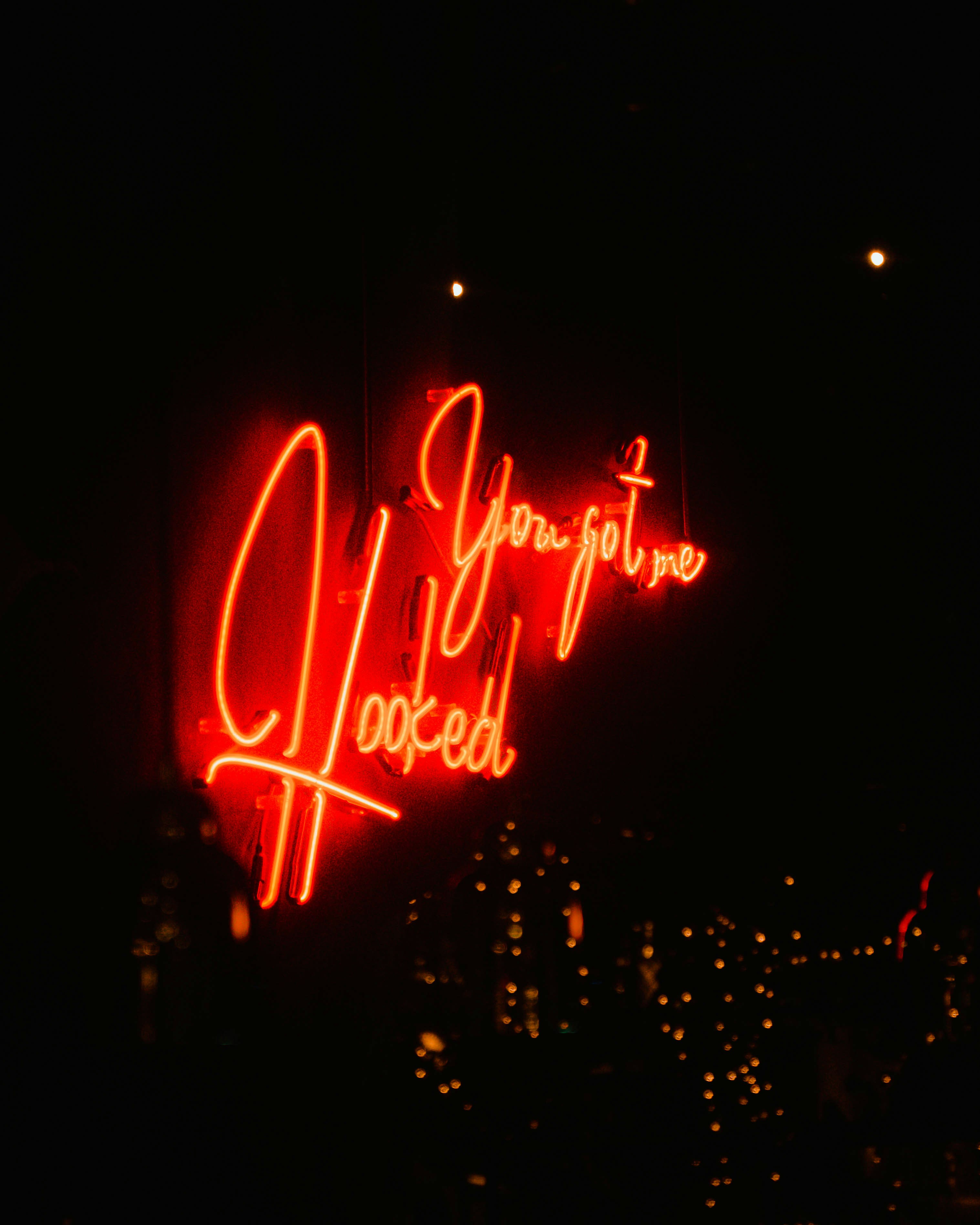a lighted sign at night