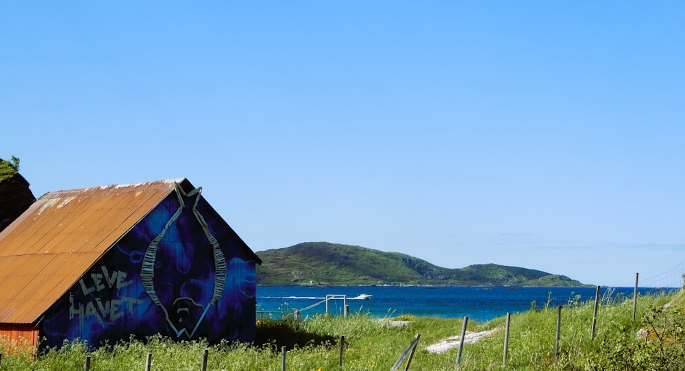 a large colorful building next to a body of water