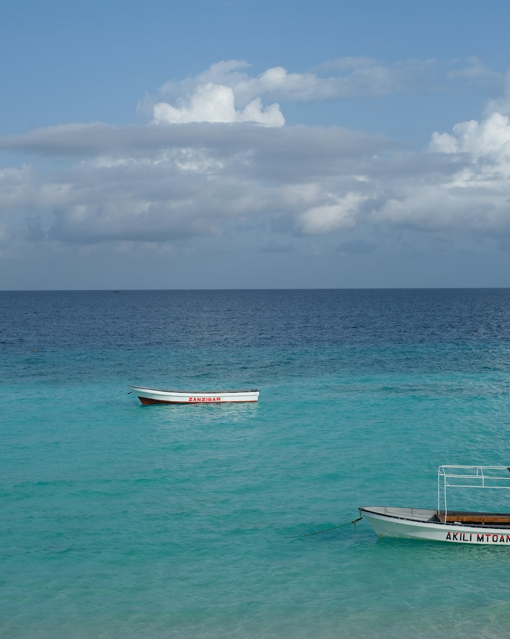 a couple of boats in the ocean