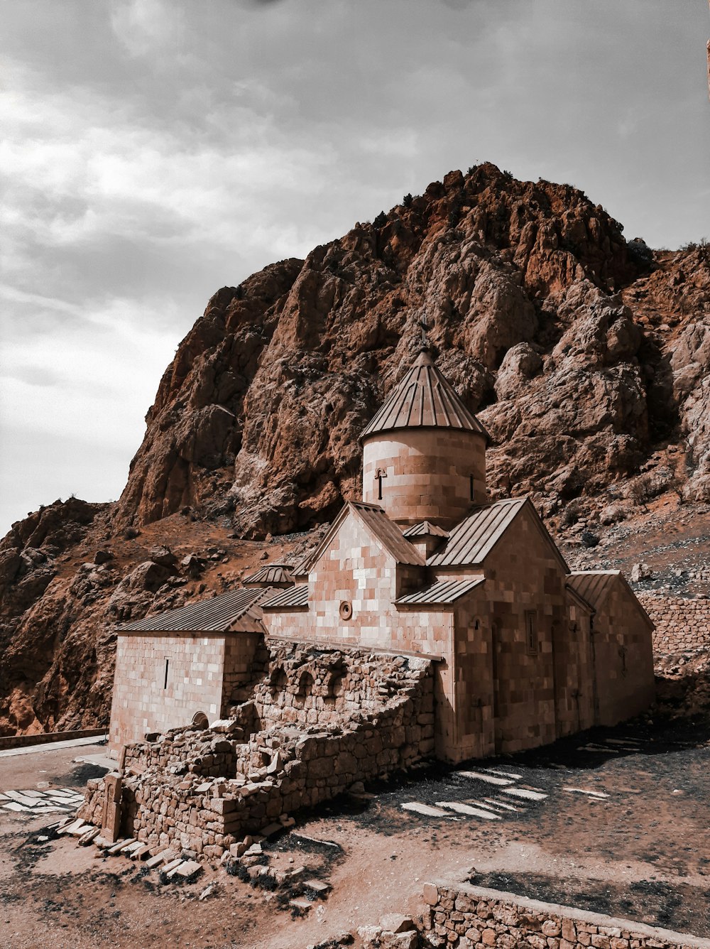 a building on a rocky hill