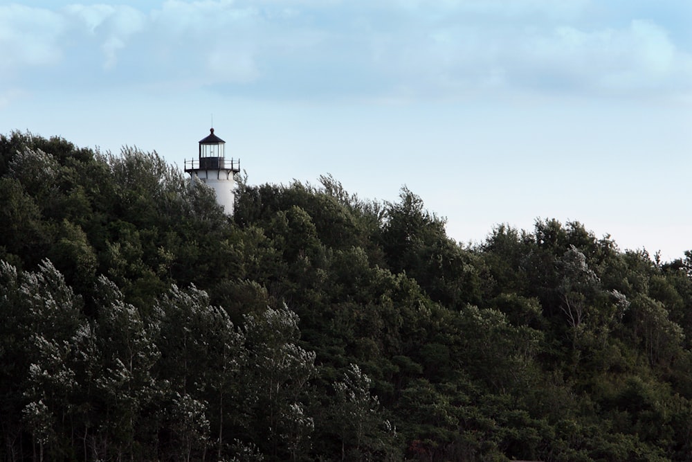 a lighthouse on a hill