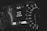 A close-up of a car dashboard displays a speedometer with numbers ranging from 0 to 220. The digital screen shows a temperature of 47°C and a message indicating that the key fob has left the vehicle. The dashboard features sleek, modern design elements with monochrome colors.