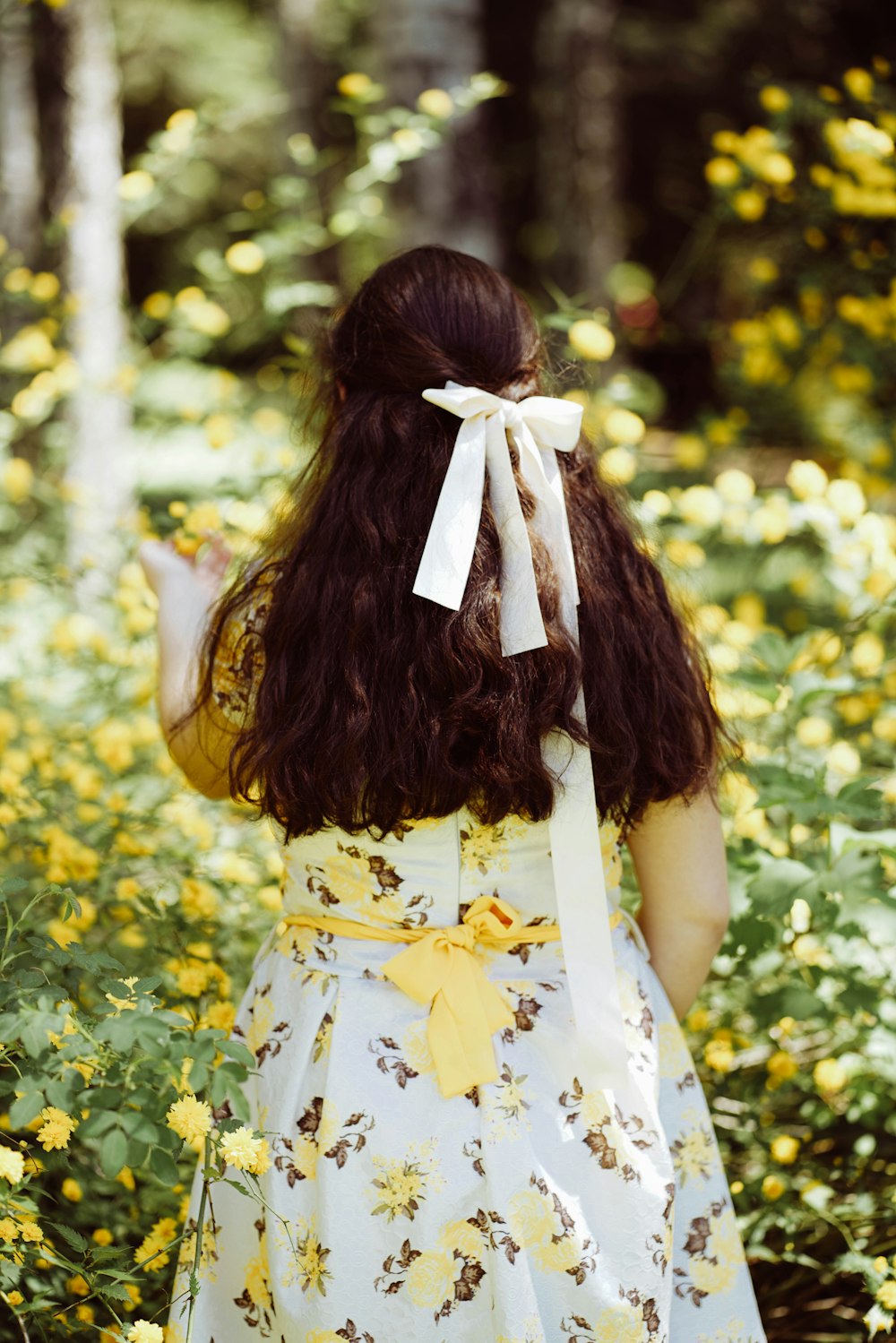 a woman wearing a white dress