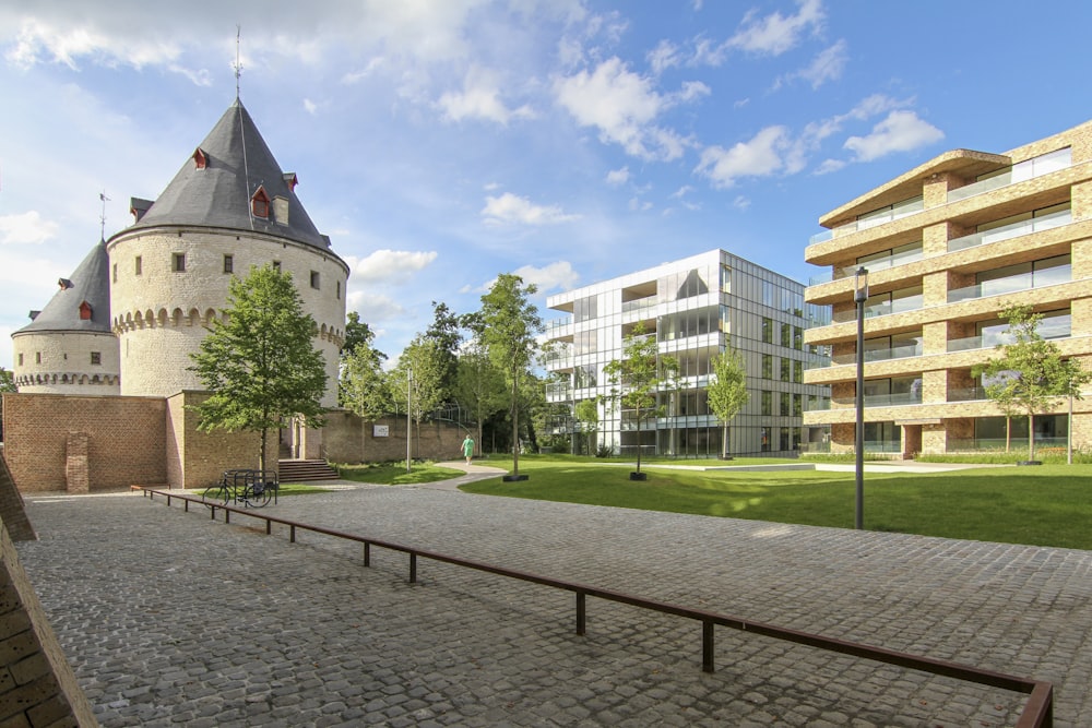 a courtyard with buildings and trees