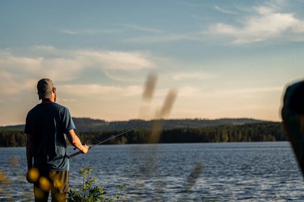 a man fishing in a lake