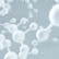A 3D illustration of interconnected white spheres resembling molecular structures set against a soft, blurred backdrop. The spheres are depicted in various sizes, connected by straight rods, creating an impression of a complex network or chemical compound.