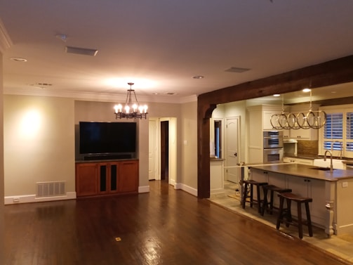 An open-concept kitchen with a large island and contemporary appliances.