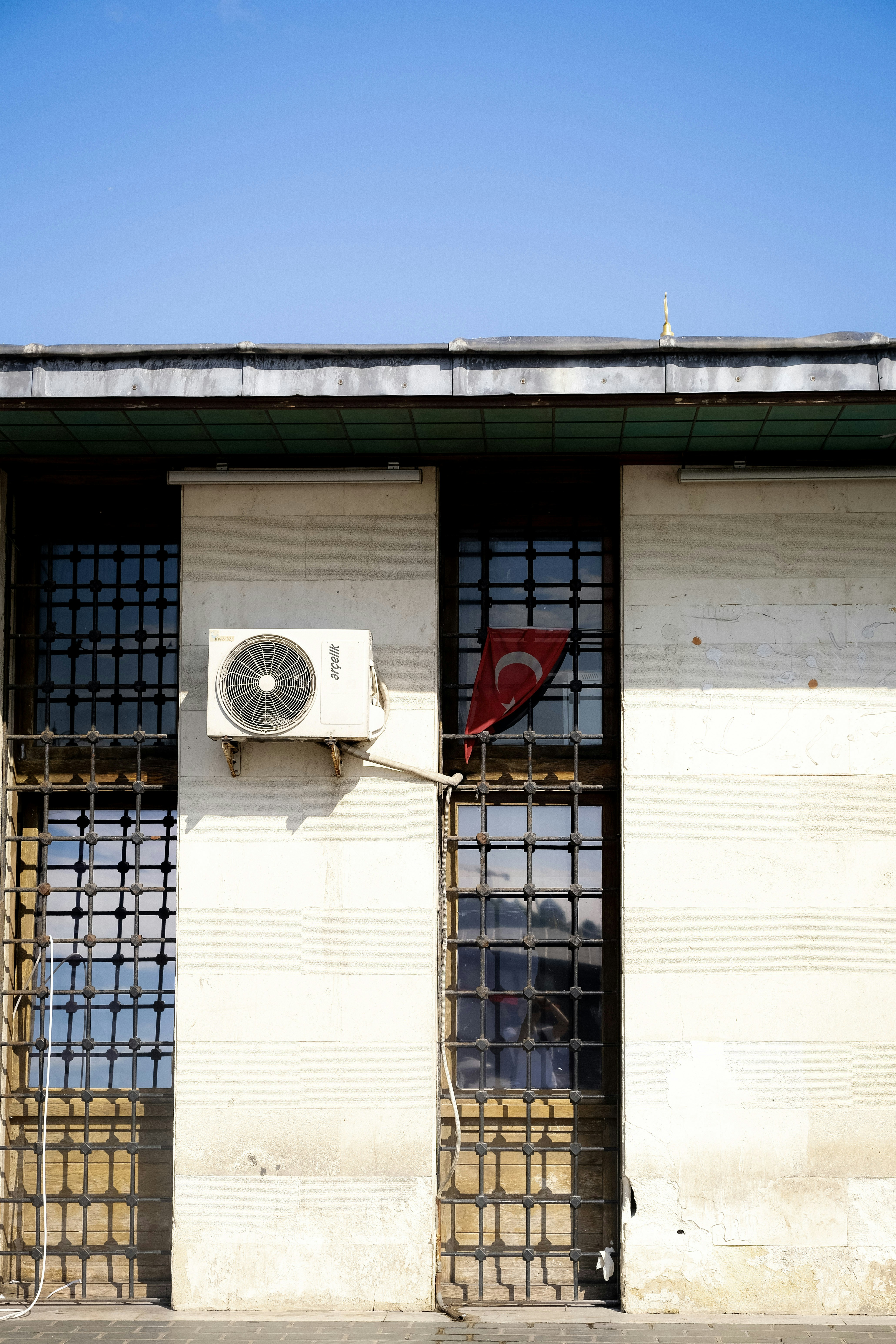 a building with a fan on the roof