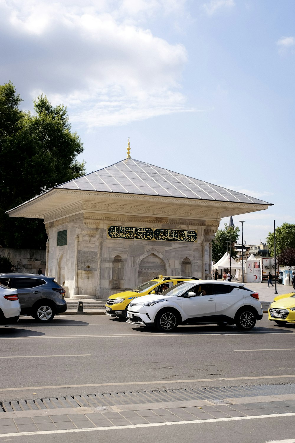 a building with cars parked in front of it