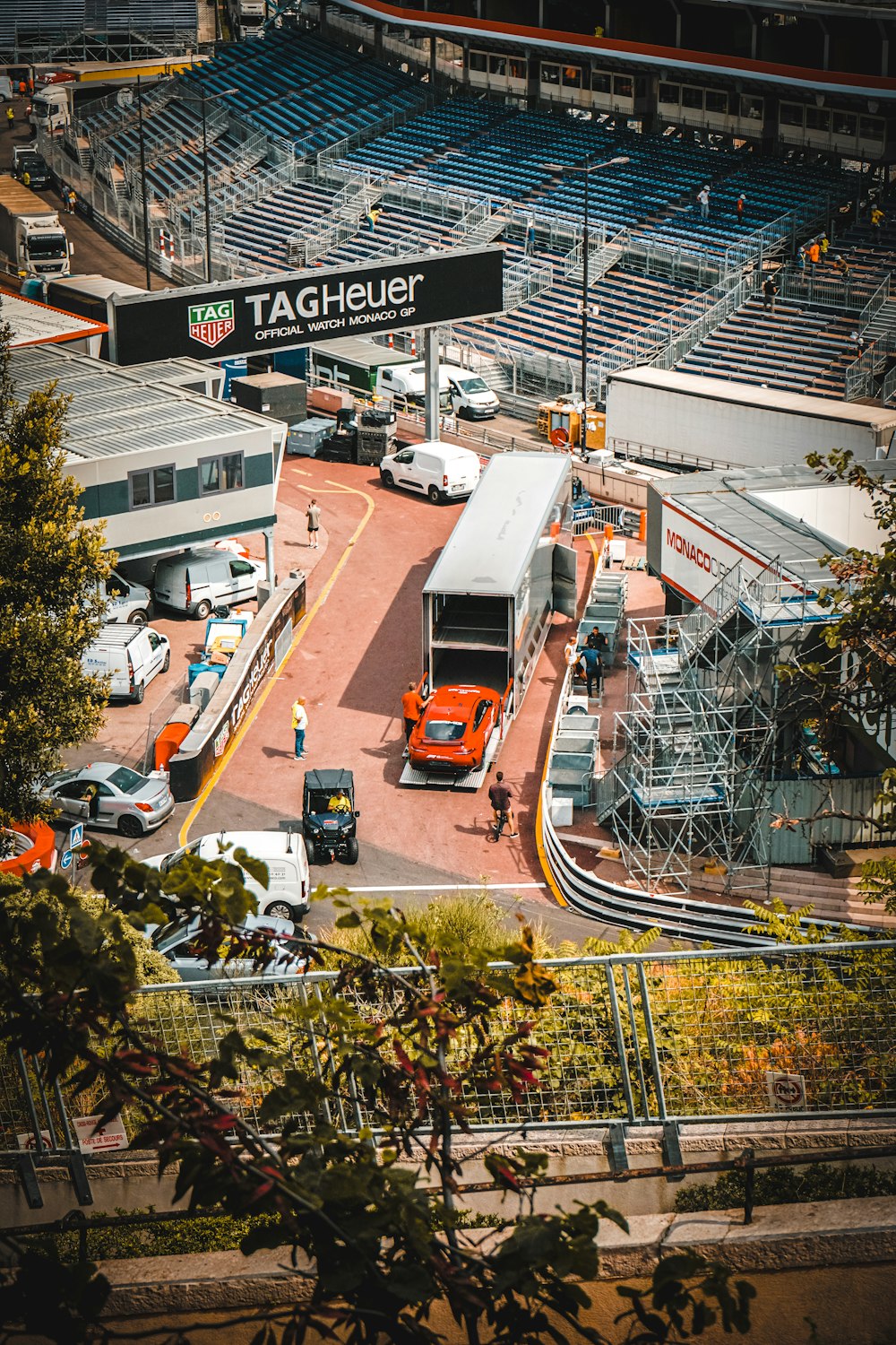 a street with cars and people