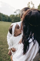 a person holding a baby