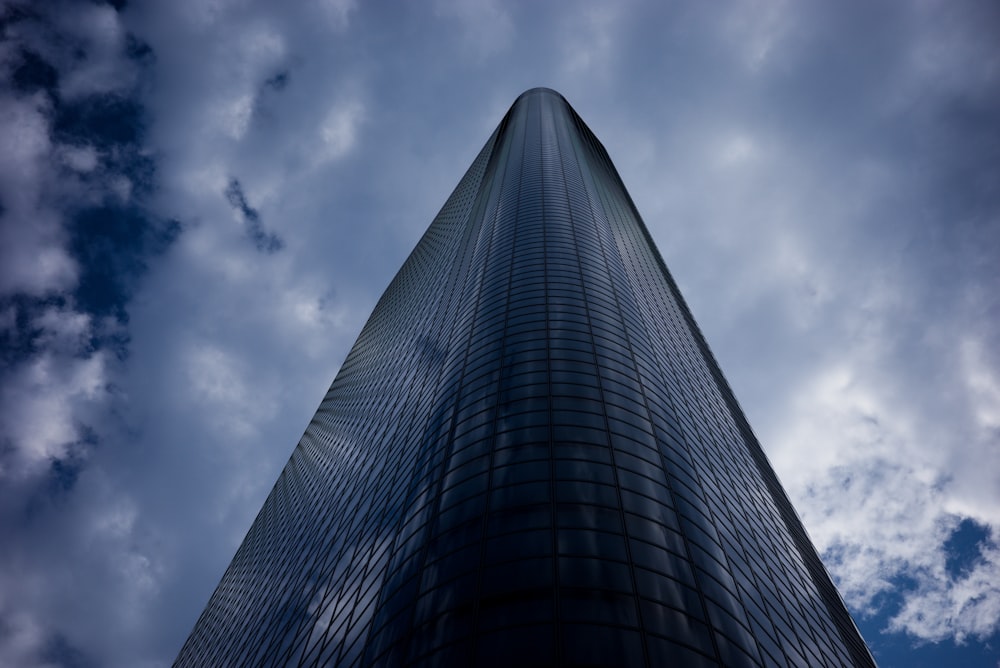 a tall building with a blue sky