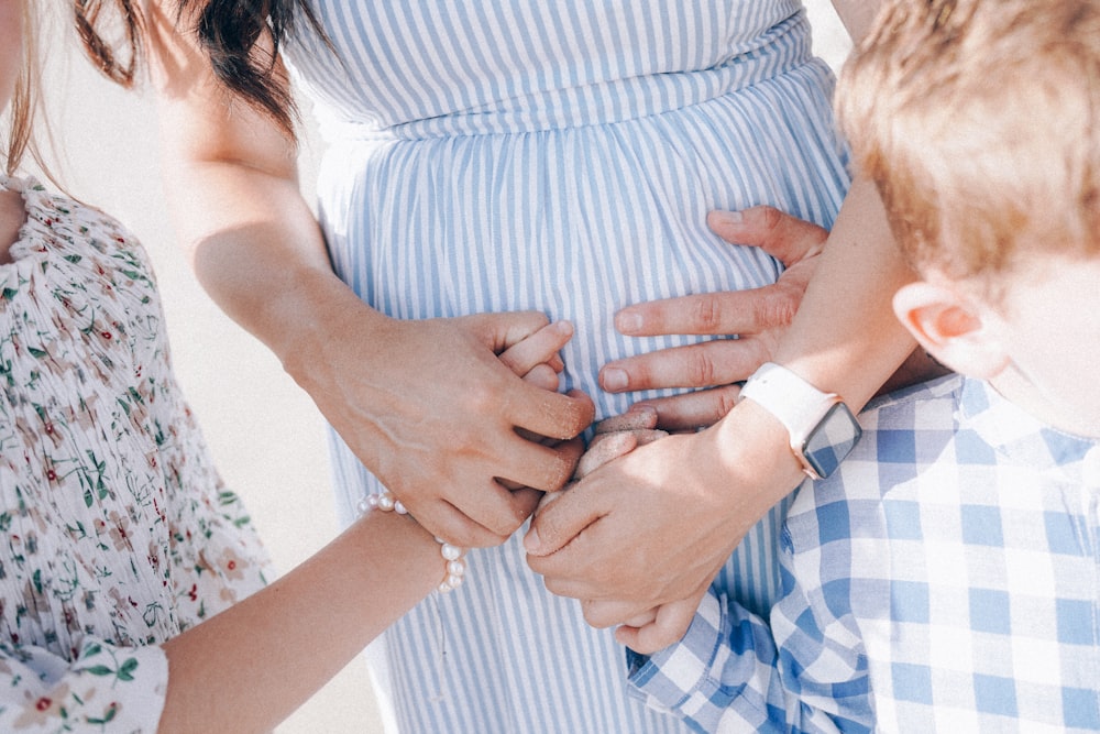 a person holding a baby