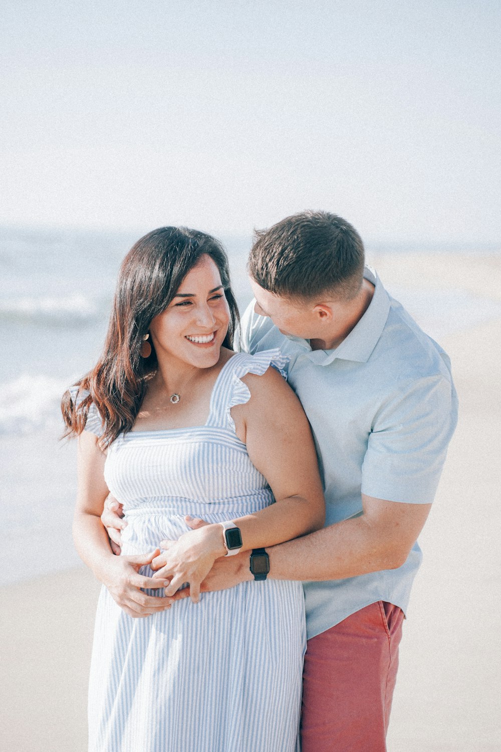 a man and woman hugging