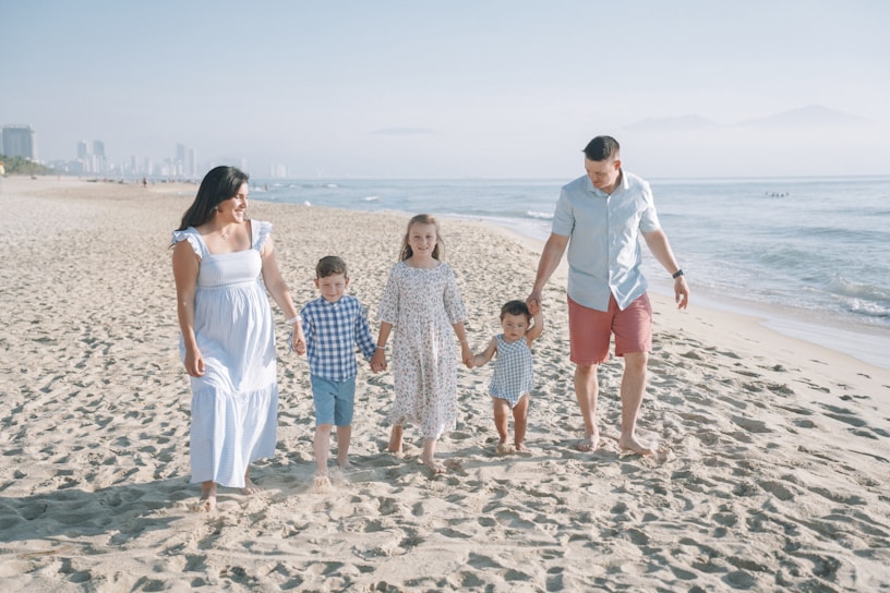 a family walking on a beach