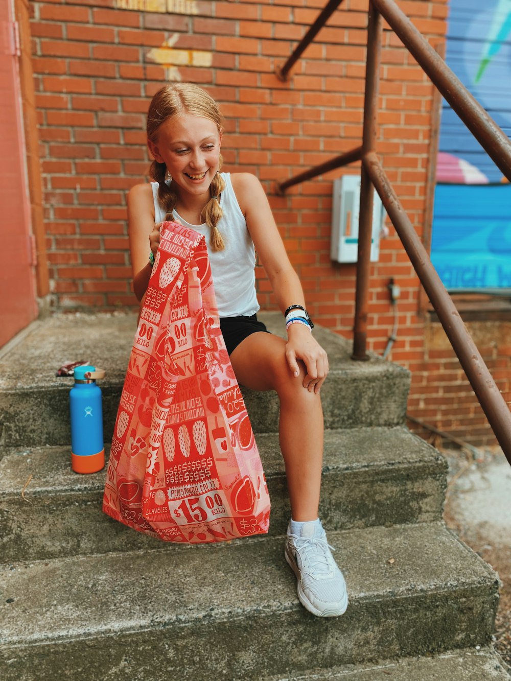 a person sitting on stairs