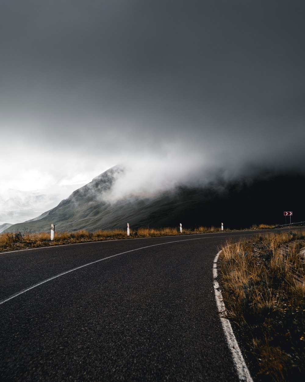 a road with a rainbow over it