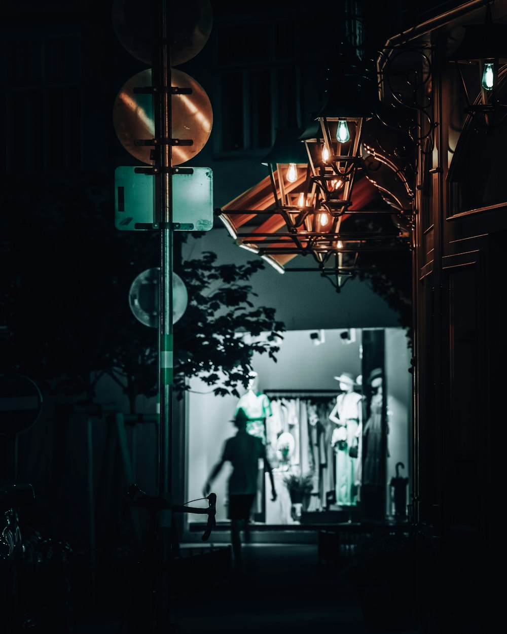 a person walking down a sidewalk