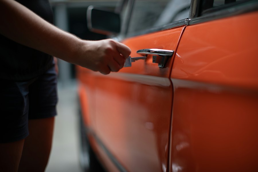 New owner opening the door of a transferred vehicle