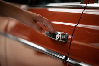 a hand holding a key chain