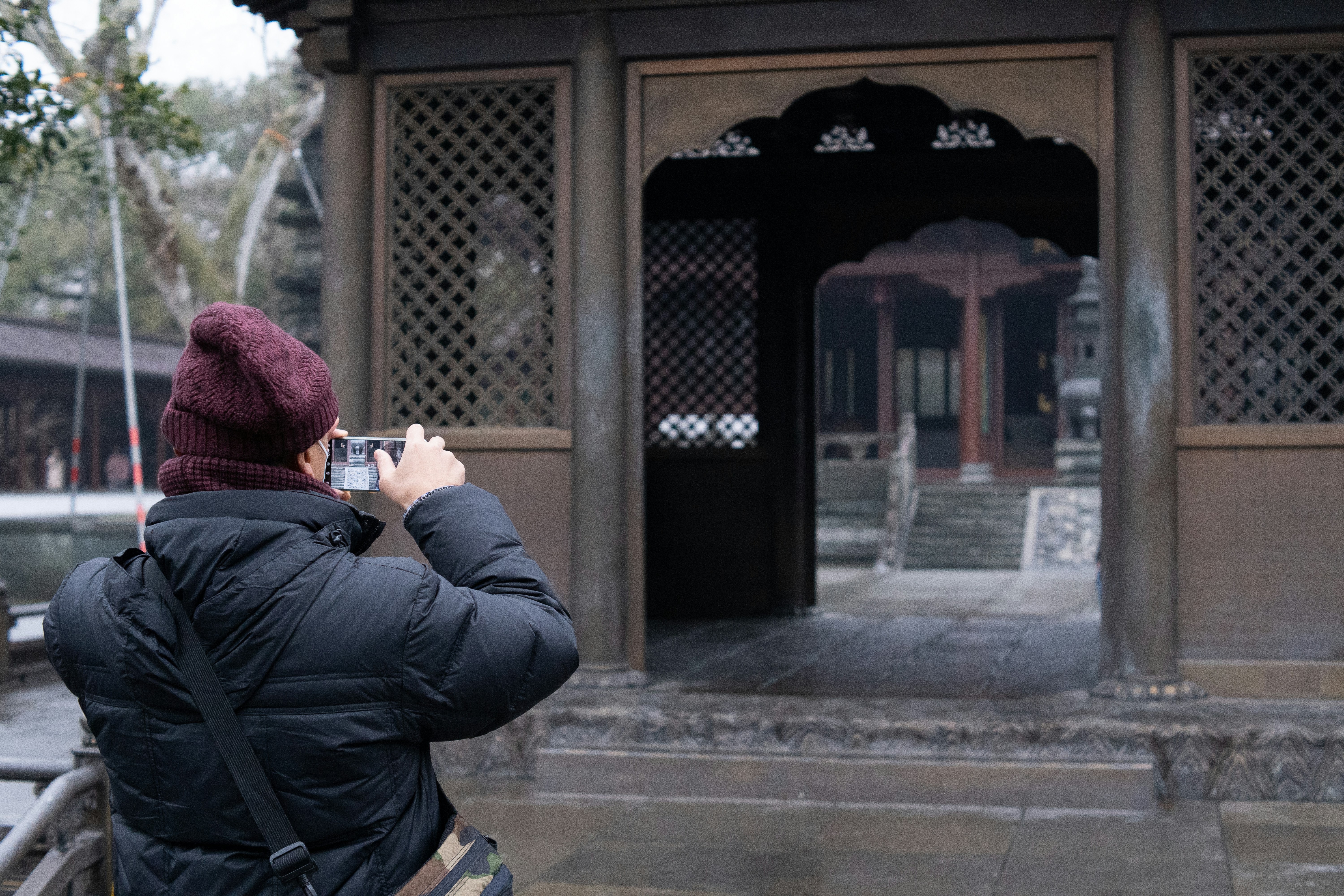 a person taking a picture of a building