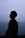 a person standing in front of a body of water
