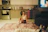 a woman sitting on the floor