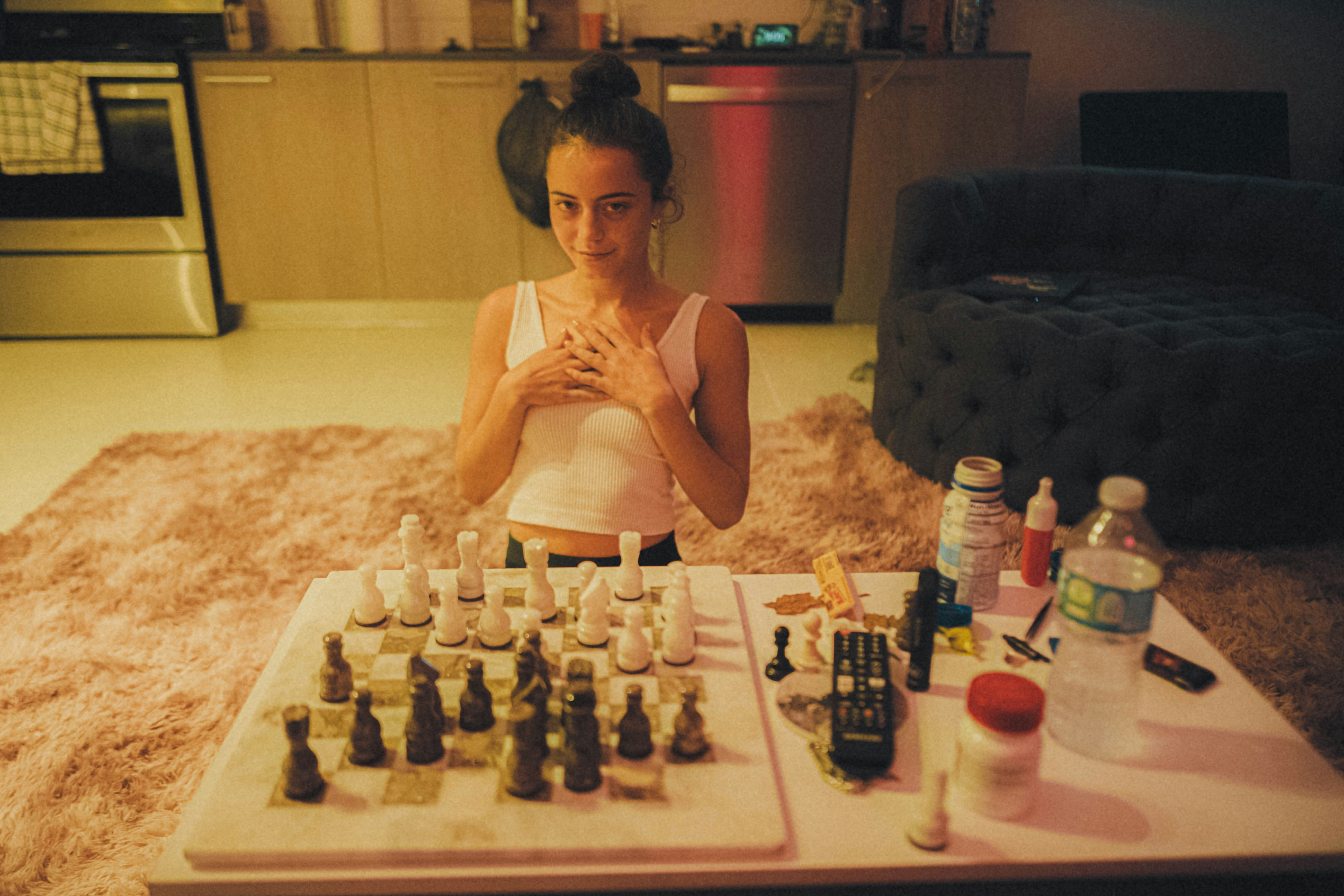 girl playing chess