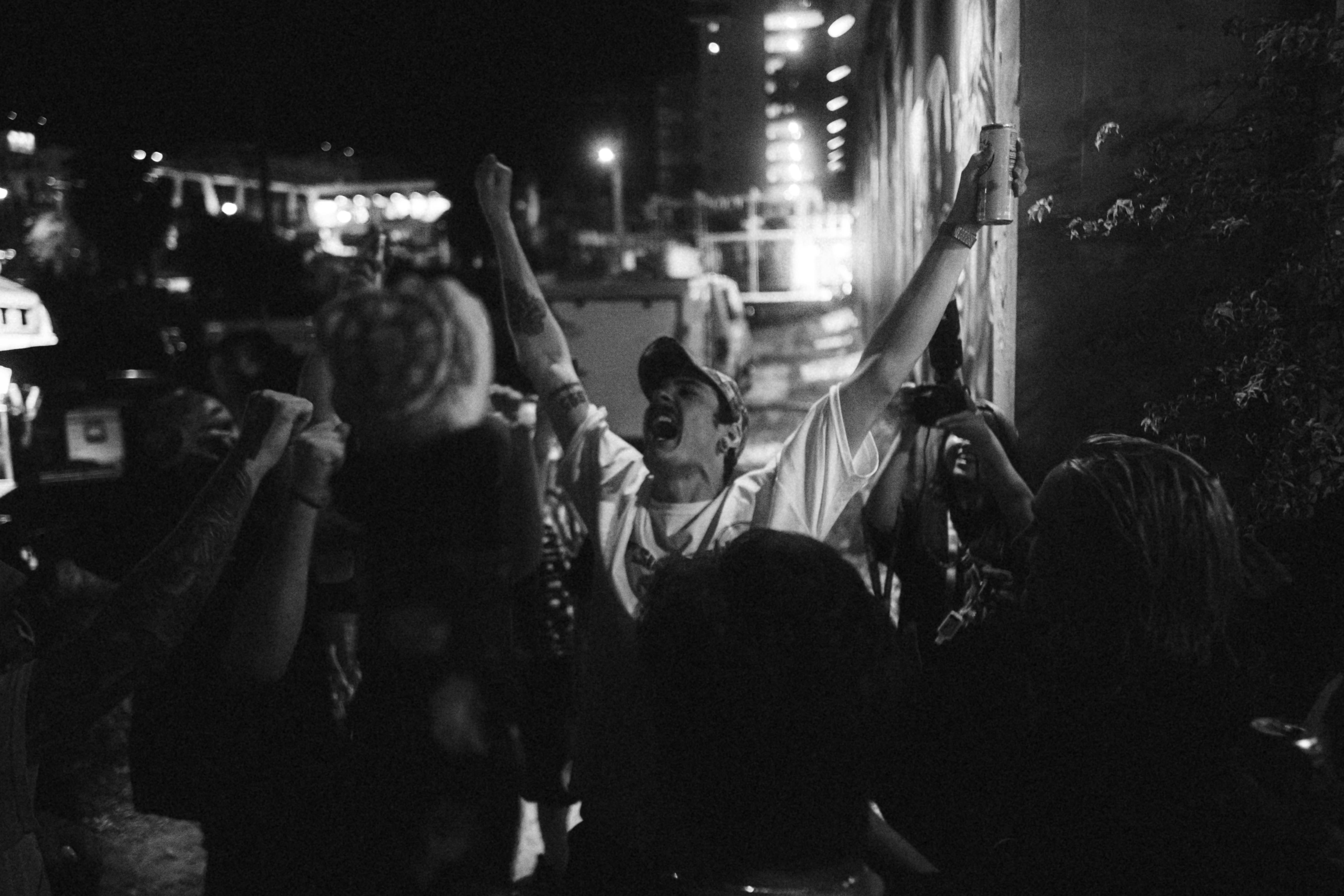 Joey Chestnut celebrating a win with fans - joey chestnut net worth