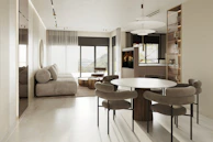 An inviting living area showcasing minimalist furniture and tasteful decor.