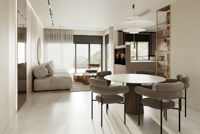 Minimalist dining area showcasing sleek imported furniture with natural textures and soft color palette.