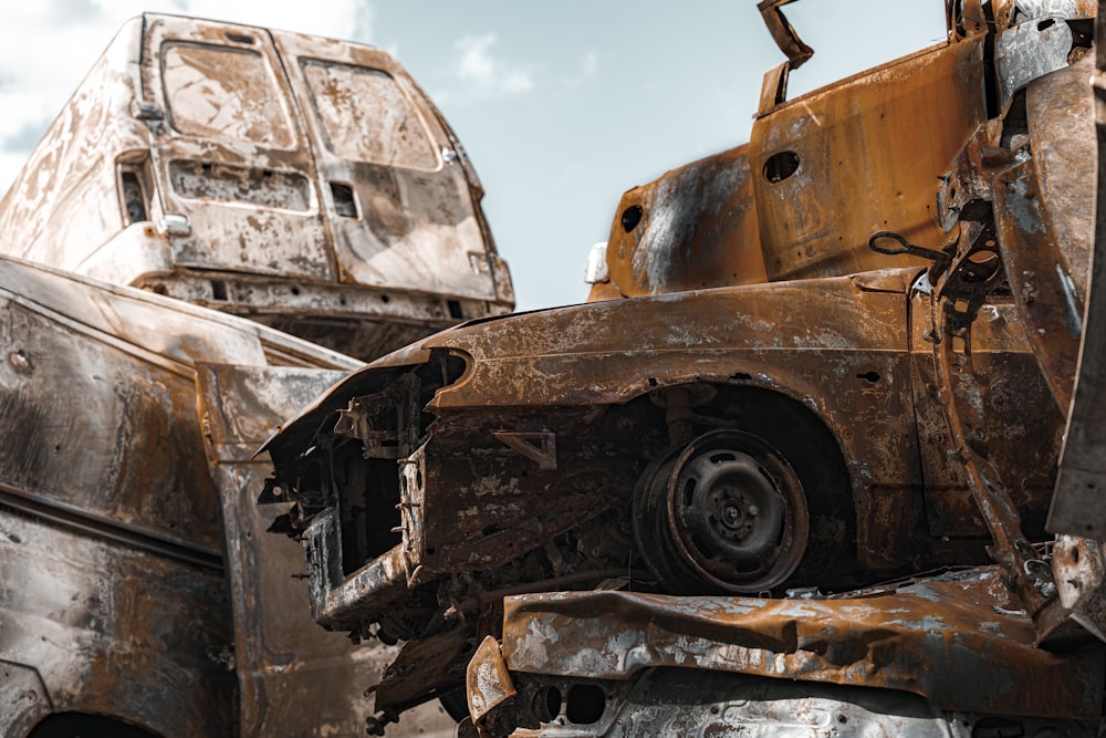 a rusted out truck with a large rusted out front