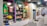 A brightly lit retail store interior featuring colorful and neatly organized merchandise displays. The walls have arches with vibrant colors like purple, teal, red, and yellow. Shelves contain a variety of items including bags, books, and small accessories. The flooring has a striped black and white pattern, and modern pendant lights hang from the ceiling.