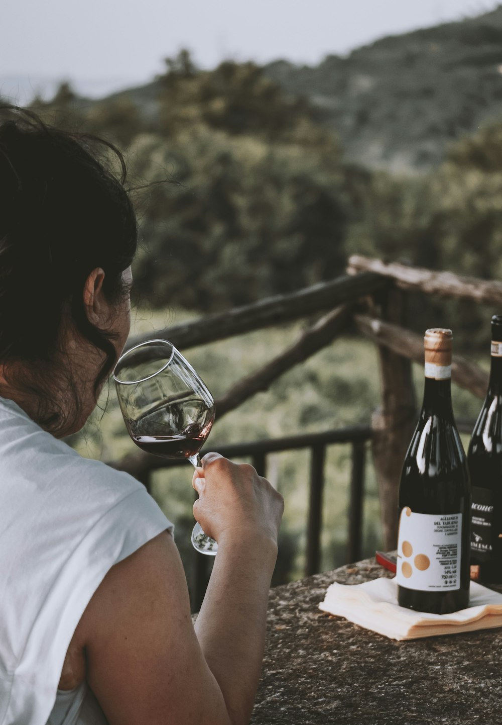 a man drinking wine